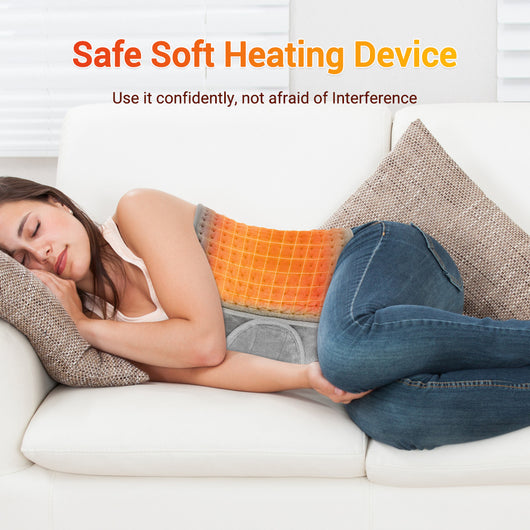 Gray quilted waist heating belt with an adjustable strap, wired remote control, and power plug, shown with its box. - Image 16