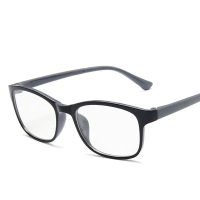 Red and black rectangular anti-blue light glasses with clear lenses, shown at an angle on a white background. - Image 2