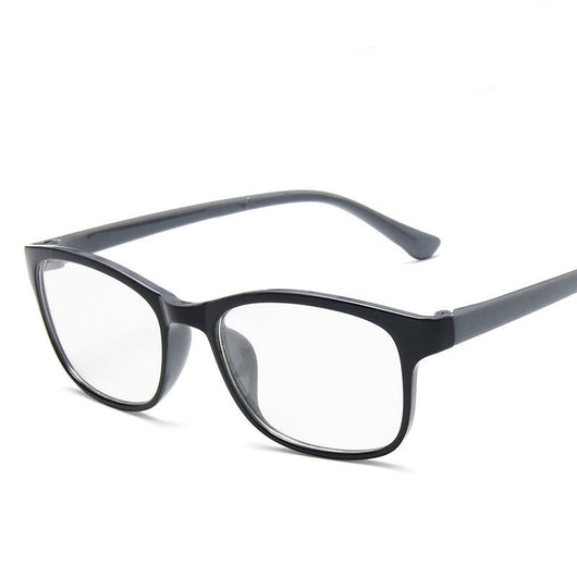 Red and black rectangular anti-blue light glasses with clear lenses, shown at an angle on a white background. - Image 2