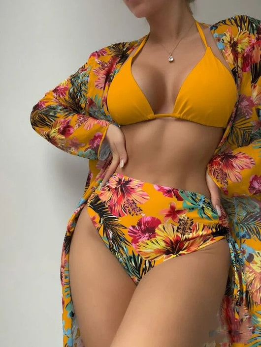 Three-piece bikini set with a solid green halter top, high-waisted tropical floral print bottoms, and matching mesh blouse. - Image 3