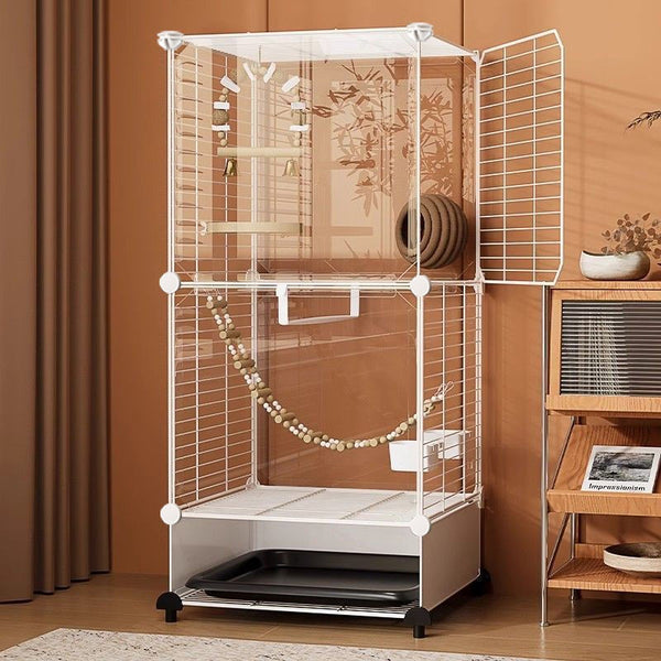 White single-layer bird cage with transparent sides, wire door, perches, bells, and a tunnel, on wheels.