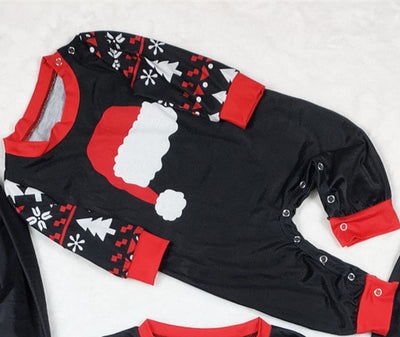 Black long-sleeve Christmas pajama top with a red Santa hat graphic and matching pants with a reindeer and tree pattern. - Image 5