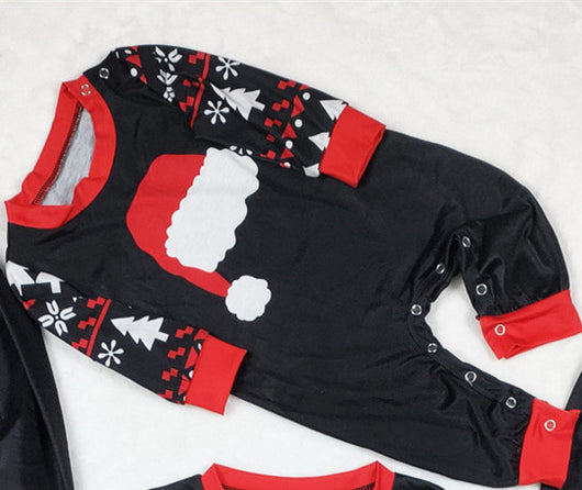 Black long-sleeve Christmas pajama top with a red Santa hat graphic and matching pants with a reindeer and tree pattern. - Image 5