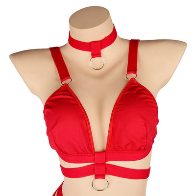 Woman wearing a royal blue strappy lingerie set with O-rings, including a bra, high-waisted bottoms, and a choker. - Image 26