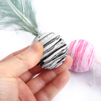 Light blue feather cat toy with a black and white marbled foam ball base on a white background. - Image 5