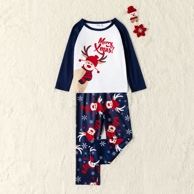 Matching family Christmas pajamas with white and navy blue long-sleeve tops, reindeer print, and "Merry Xmas!" text. - Image 14