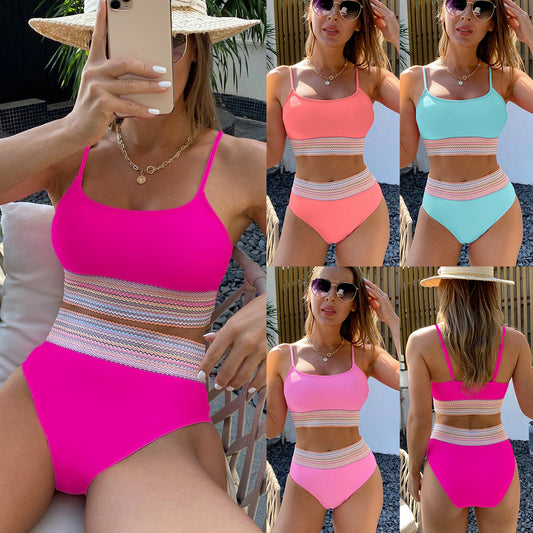 Hot pink split triangle high-waisted bikini with a colorful striped band, worn by a woman in a straw hat.
