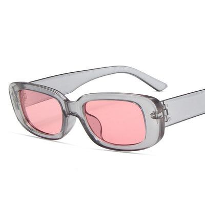 Black rectangular fashion sunglasses with dark lenses, featuring a thick frame and temples, angled on a white background. - Image 3