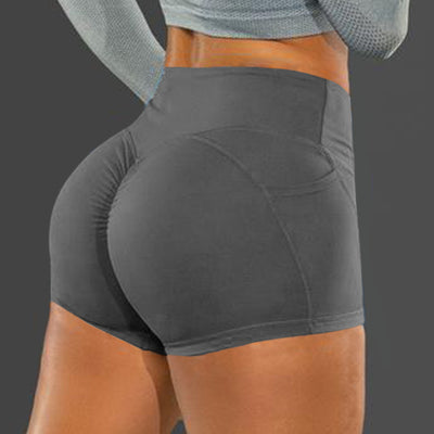 Leggins Deportivos de Color Sólido con Levantamiento en Bolsillos - Image 7