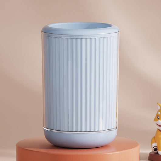 Light blue pet foot washing cup with a white paw print design, ribbed texture, and smooth base. - Image 9