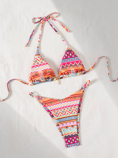 Vibrant geometric print triangle-bra bikini swimsuit with adjustable ties and high-cut ruched bottom. - Image 13