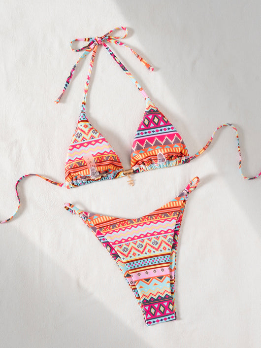 Vibrant geometric print triangle-bra bikini swimsuit with adjustable ties and high-cut ruched bottom. - Image 13