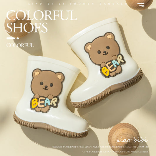 White children's rain boots with a brown cartoon bear holding colorful 'BEAR' lettering and a white fleece lining. - Image 2