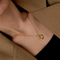 Colar Feminino Dourado Snake Bone Chain com Pingente Redondo Irregular Edição Golden Pearl