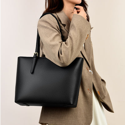 Bolsa de Hombro Commuter de Gran Capacidad y Diseño Versátil