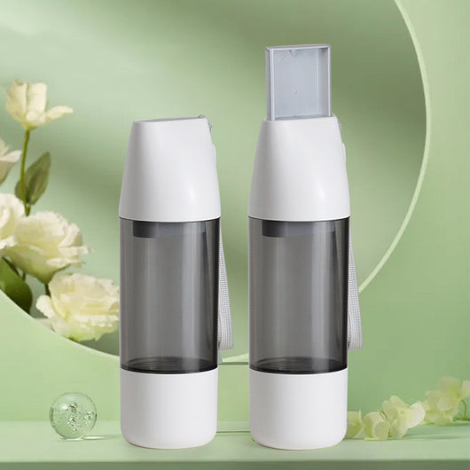 White and translucent gray portable pet water bottle with integrated food container and carrying strap. - Image 14