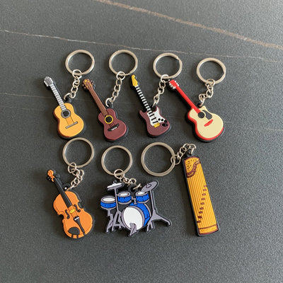 Llavero Guitarra de Silicona - Accesorio Musical Versátil - Image 33