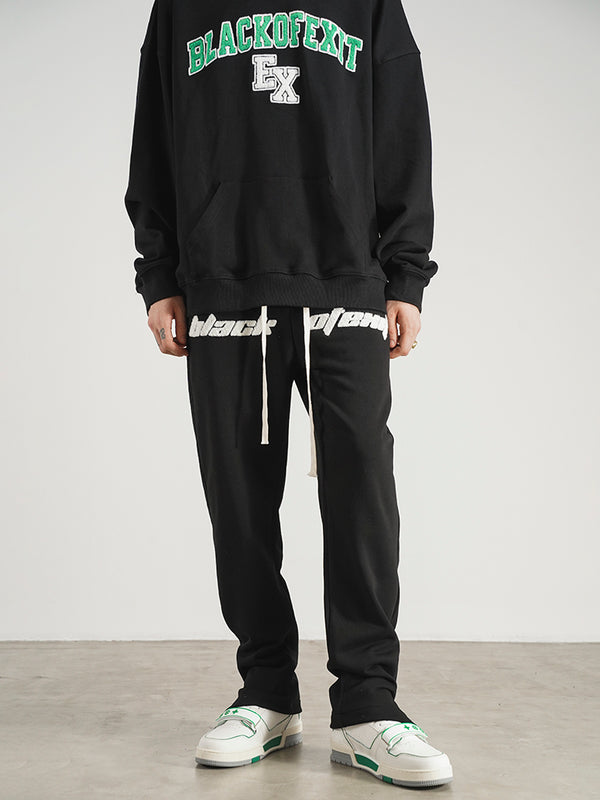 Pantalones de Buzo con Aberturas Laterales y Cordón Ajustable
