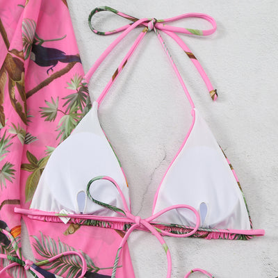 Milky white floral print three-piece swimsuit with triangle bikini top, v-cut bottom, and sheer long-sleeve cover-up. - Image 26