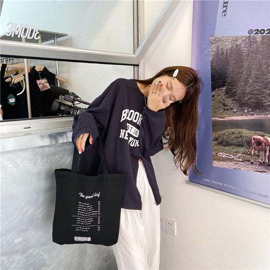 Bolsa de Lona Grande Estilo Coreano con Capacidad Extra para Compras y Viajes - Image 7
