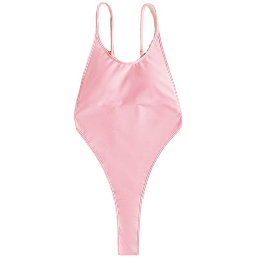Light pink one-piece swimsuit with thin spaghetti straps and a high-cut leg design, worn by a woman. - Image 2