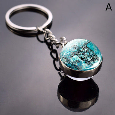 Llavero Esfera de Vidrio con Tortuga y Estrella de Mar - Diseño Divertido - Image 3