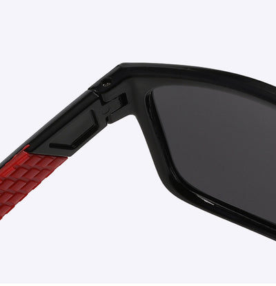 Black and blue polarized sports sunglasses with rectangular frames and blue mirrored lenses reflecting snowy mountains. - Image 20