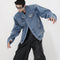 Chaqueta Denim Cropped con Paneles Metálicos y Hombreras