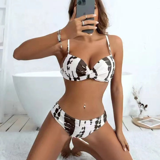 Women's two-piece bikini with a white and dark red abstract pattern. Features a push-up top and classic brief bottoms. - Image 9