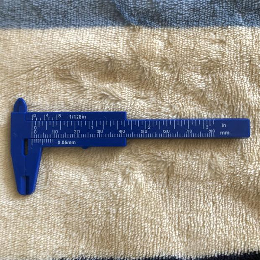 Regla de Doble Escala Plástica para Mediciones Precisas - Image 24
