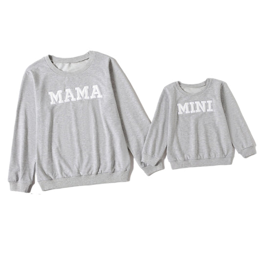 White long-sleeve adult sweater with "MAMA" text and matching child's sweater with "MINI" text. - Image 7