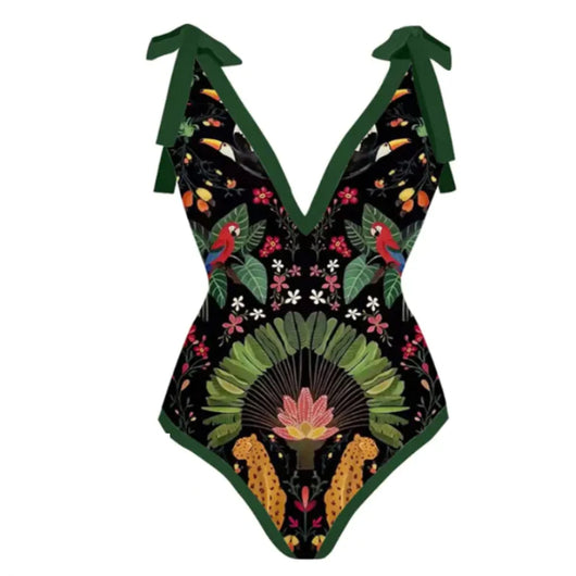 Women's black one-piece swimsuit with a deep V-neck and shoulder ties, featuring a vibrant tropical print of parrots, toucans, leopards, and flowers. - Image 3