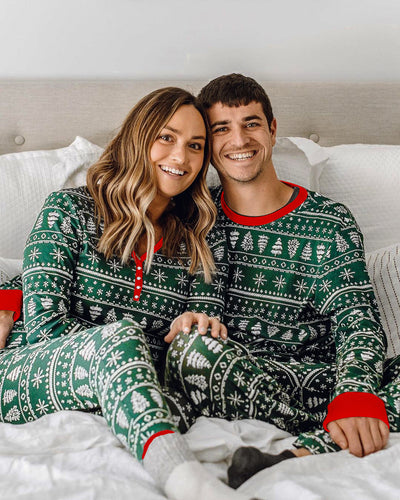 Red and white Christmas print one-piece pajama suit with reindeer, Christmas trees, and snowflakes. - Image 13