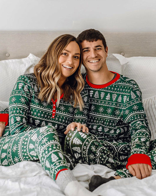 Red and white Christmas print one-piece pajama suit with reindeer, Christmas trees, and snowflakes. - Image 13