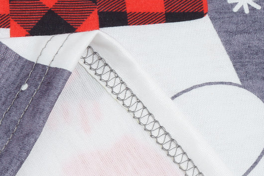 Family of five wearing matching gray and red buffalo plaid Christmas pajamas with polar bear print. - Image 18