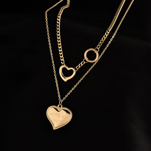 Cadena de Suéter Corazón Apilable en Acero Titanio - Image 9