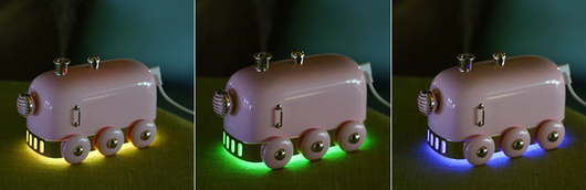 Pink retro mini train ultrasonic humidifier and aroma diffuser with rose gold accents on a white background. - Image 12