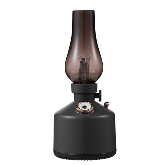 Wood grain kerosene lamp air humidifier with a clear glass-like top and a white light element, featuring a gold control knob. - Image 2