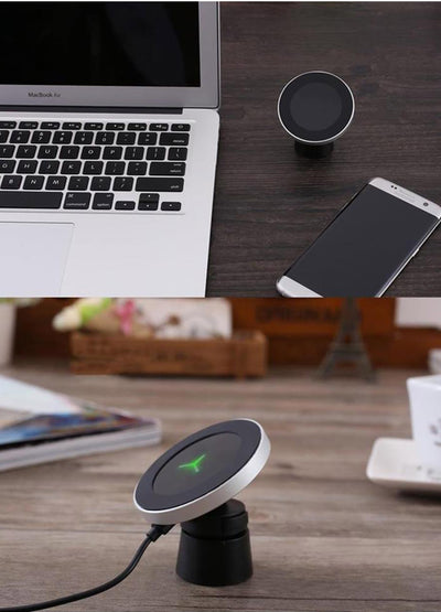 Silver and black car magnetic wireless charger with a blue indicator light, mounted on a car's air vent. - Image 14