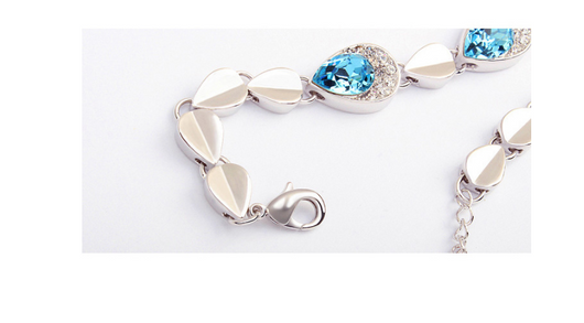 Pink teardrop crystal jewelry set with silver-tone necklace, bracelet, and stud earrings, accented with clear stones. - Image 7