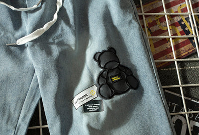 Jeans Vintage Sueltos para Hombre con Estampado de Oso y Letras - Image 5