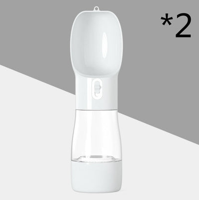 White and clear portable dog water dispenser with a built-in bowl and transparent water reservoir. - Image 12