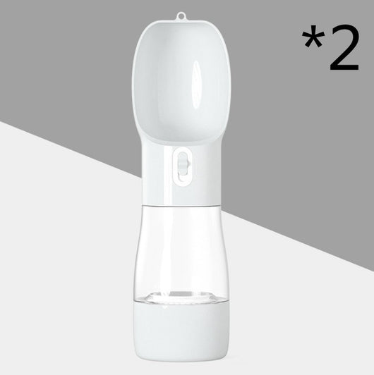 White and clear portable dog water dispenser with a built-in bowl and transparent water reservoir. - Image 12