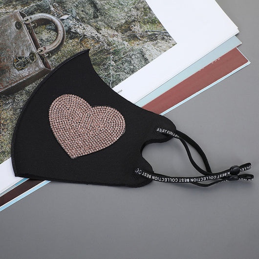 Black ear-mounted mask with a sparkling rhinestone bow pattern, featuring adjustable ear loops. - Image 24