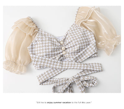 Women's conservative two-piece swimsuit with beige and white houndstooth pattern, sheer puff sleeves, and a flared skirt. - Image 18