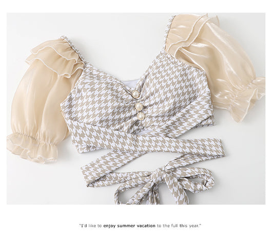 Women's conservative two-piece swimsuit with beige and white houndstooth pattern, sheer puff sleeves, and a flared skirt. - Image 18