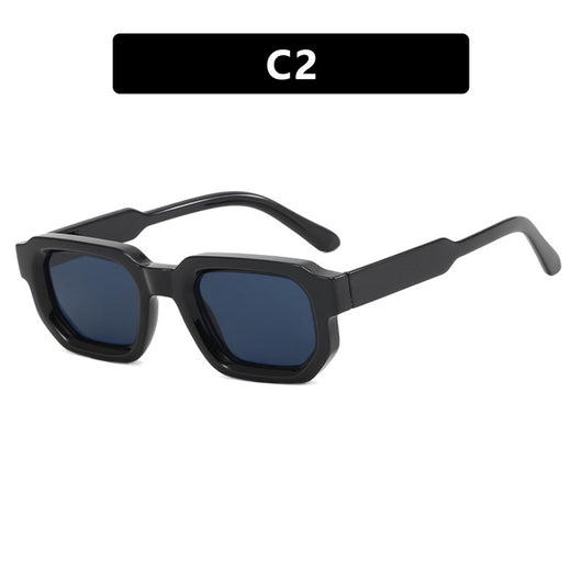 Black square-frame sunglasses with thick, angular frames and dark blue lenses, shown on a white background. - Image 7