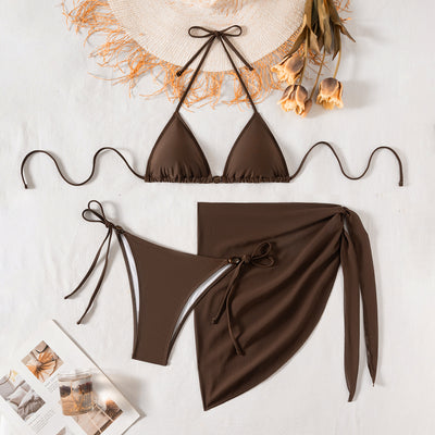 Solid brown three-piece bikini swimsuit set with a triangle top, beaded accessory, and matching sarong skirt. - Image 3