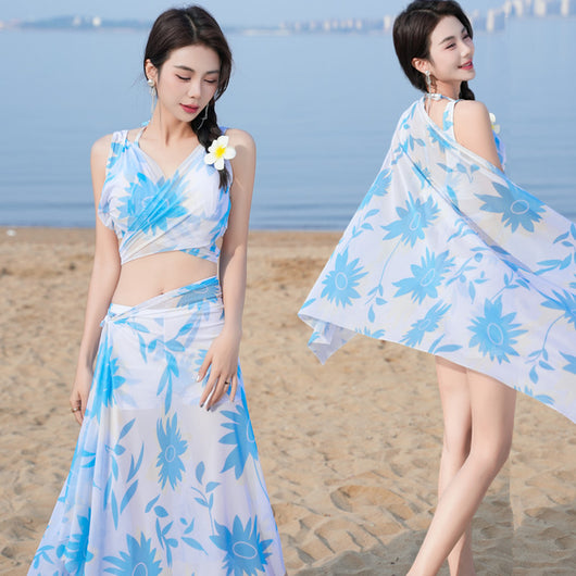Women's light blue tropical leaf print three-piece swimsuit with short sleeve bikini top, bottoms, and sarong skirt. - Image 22