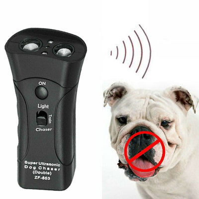 Yellow and black ultrasonic dog training devices with wrist straps, one in retail packaging. - Image 25